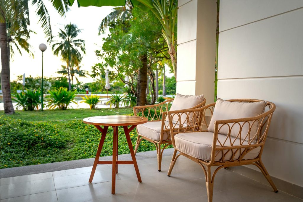 Rattan garden furniture set on a serene outdoor patio