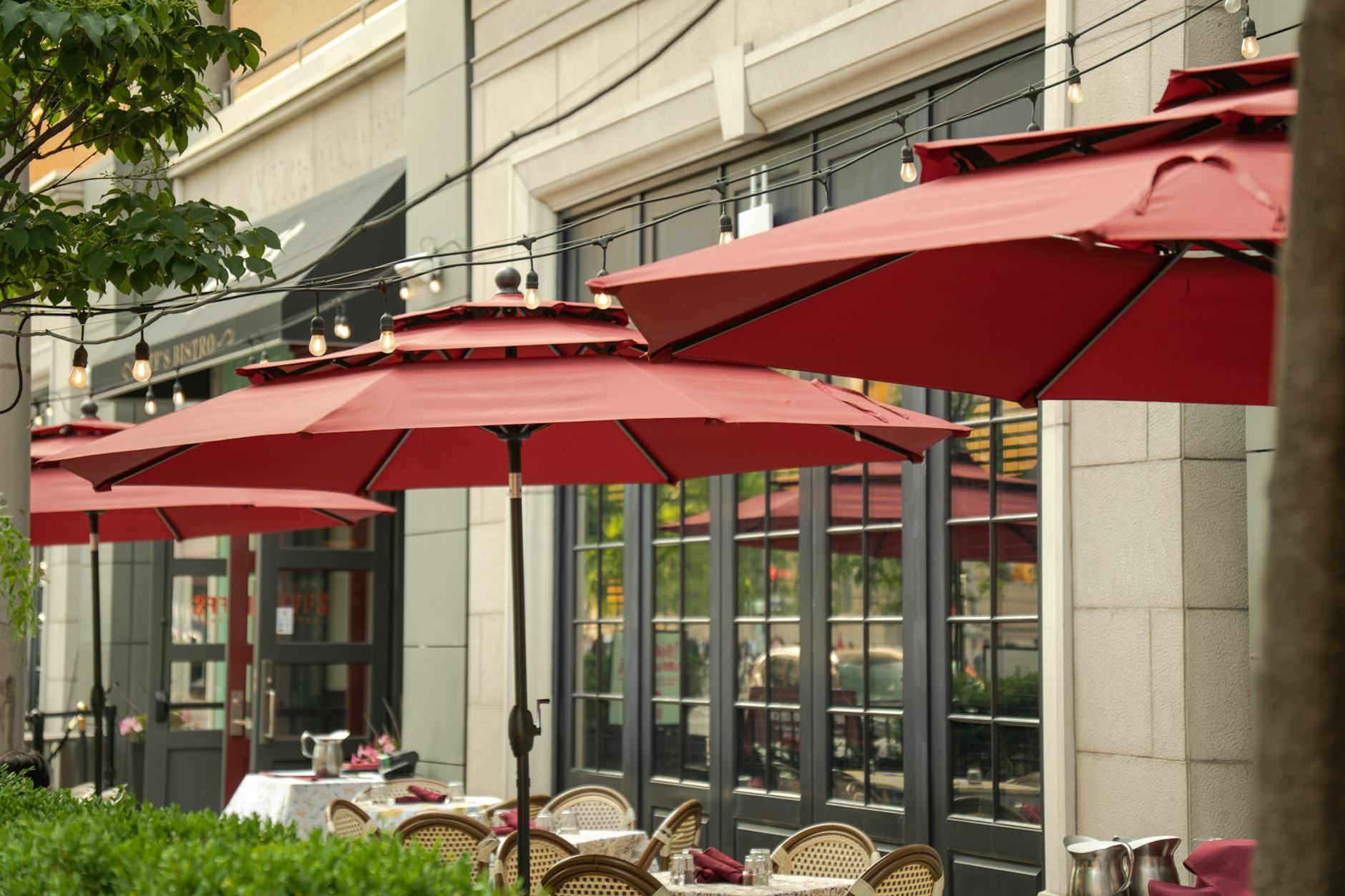 Outdoor dining table set on a patio in summer ready for entertaining