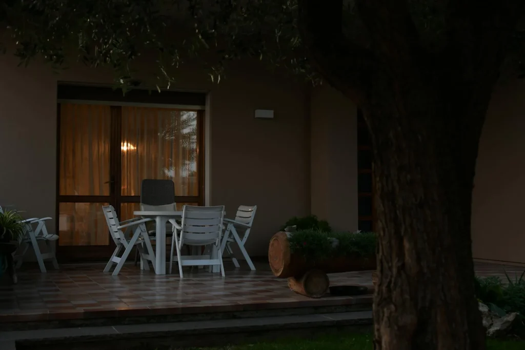 LED path lights illuminating residential garden walkway at evening