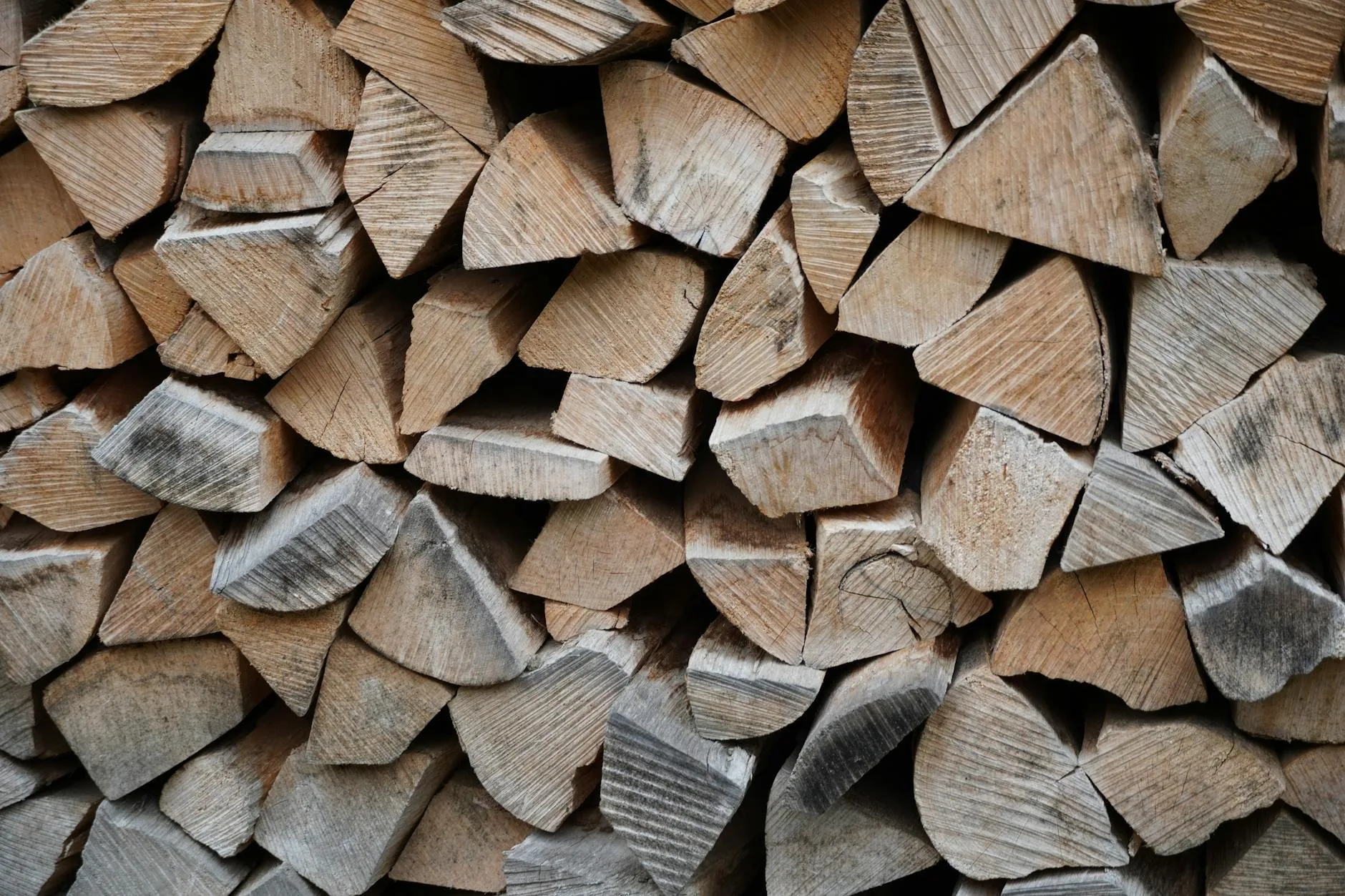 Stacked firewood logs ready for chiminea burning