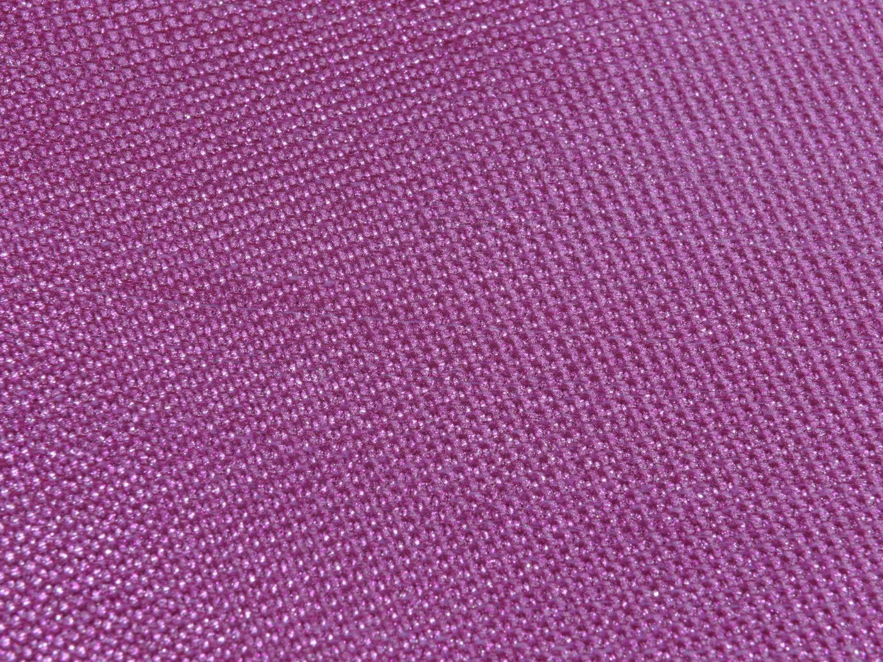 Synthetic outdoor rug weave on a patio floor