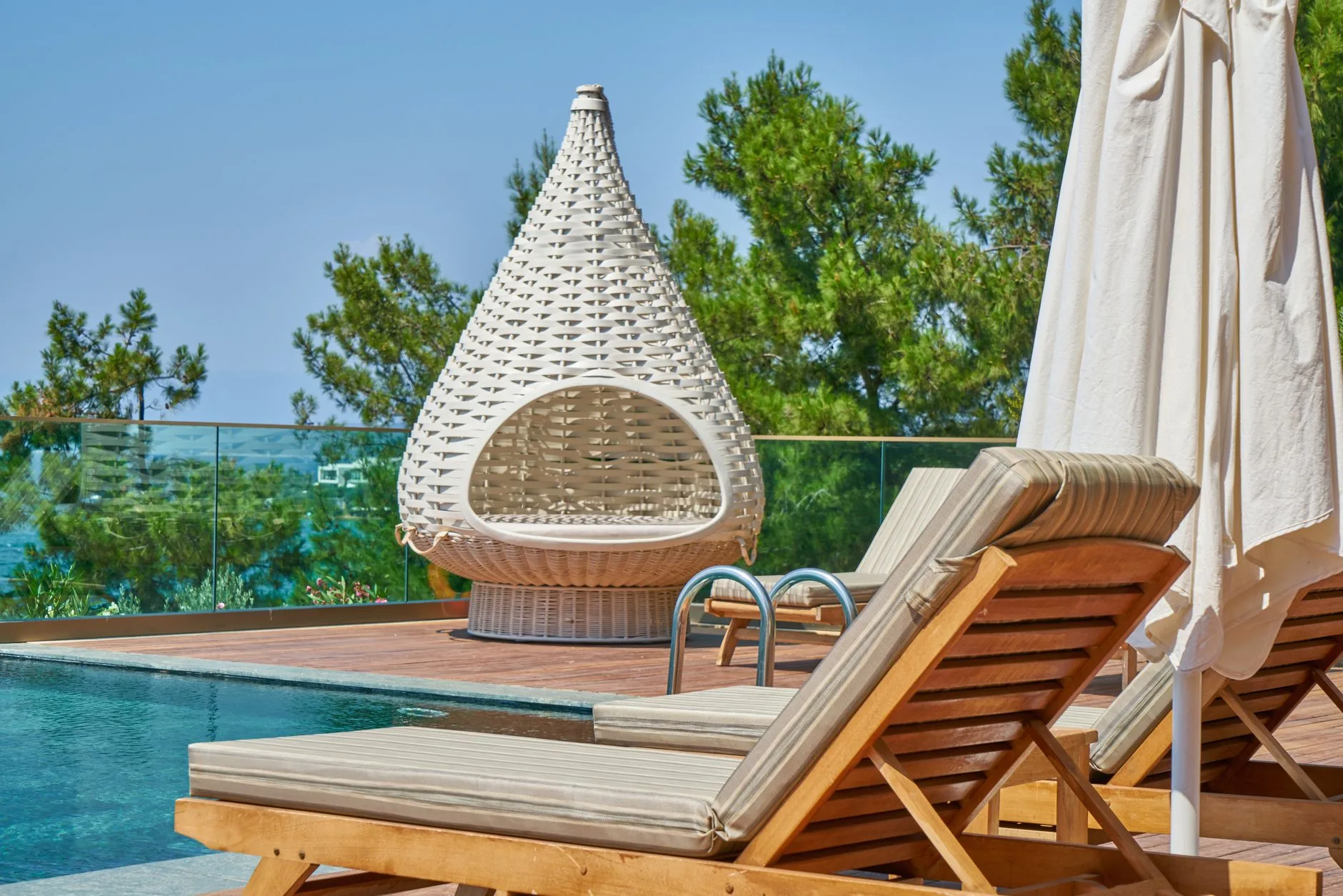 Rattan egg chair on a sheltered patio